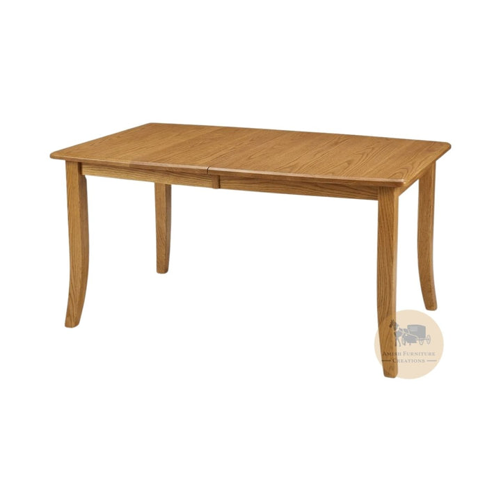A golden oak wooden extendable dining table with 4 legs shown from a three-quarter angle on a white background, with an Amish Furniture Creations logo in the lower right.