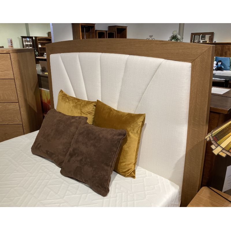 Clearance wooden Quarter Sawn White Oak bedroom fabric upholstered headbaord detail - in a showroom - Amish Furniture Creations™